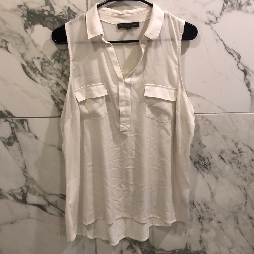 Ivory colored, collared tank top with pockets